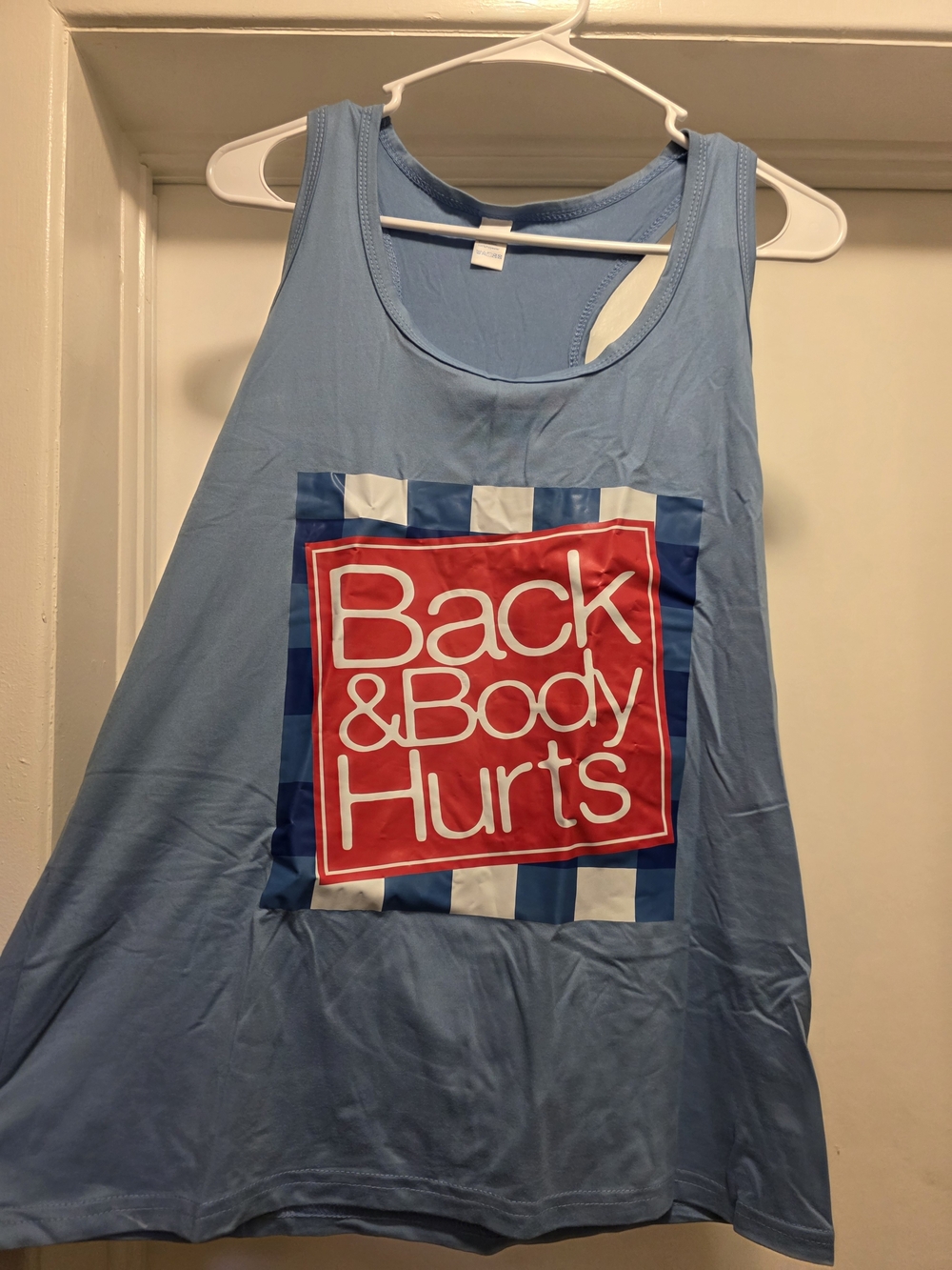 Light Blue Tank Top with Red Graphic 'Back & Body Hurts'
